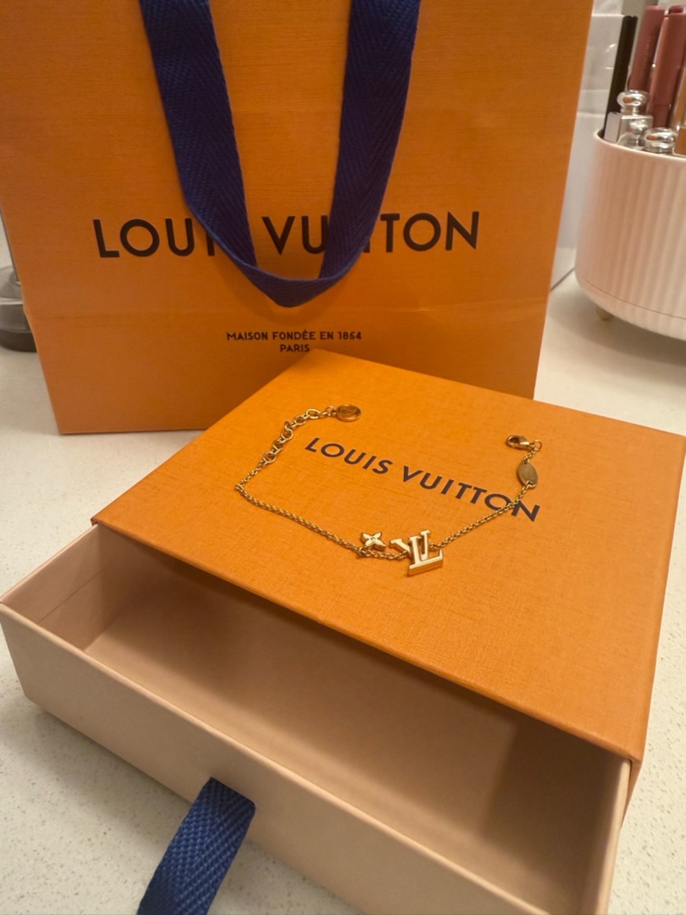Louis Vuitton Gold-Tone LV Charm White Enamel Bracelet - Picture 2 of 6
